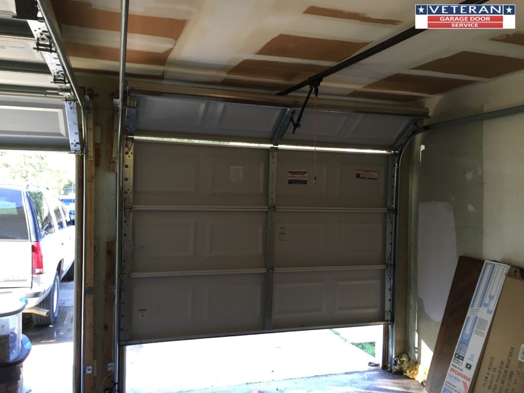 Simple Electric Garage Door Goes Up But Not Down for Large Space