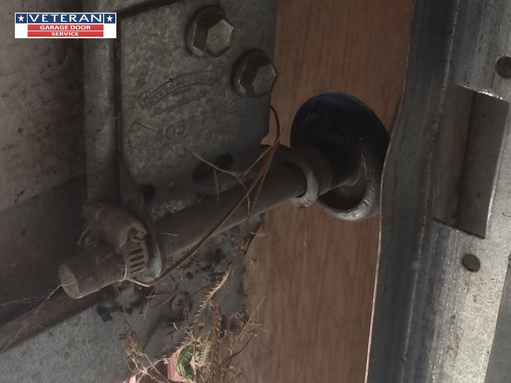 One of the rollers on my garage door broke, how can I fix it?