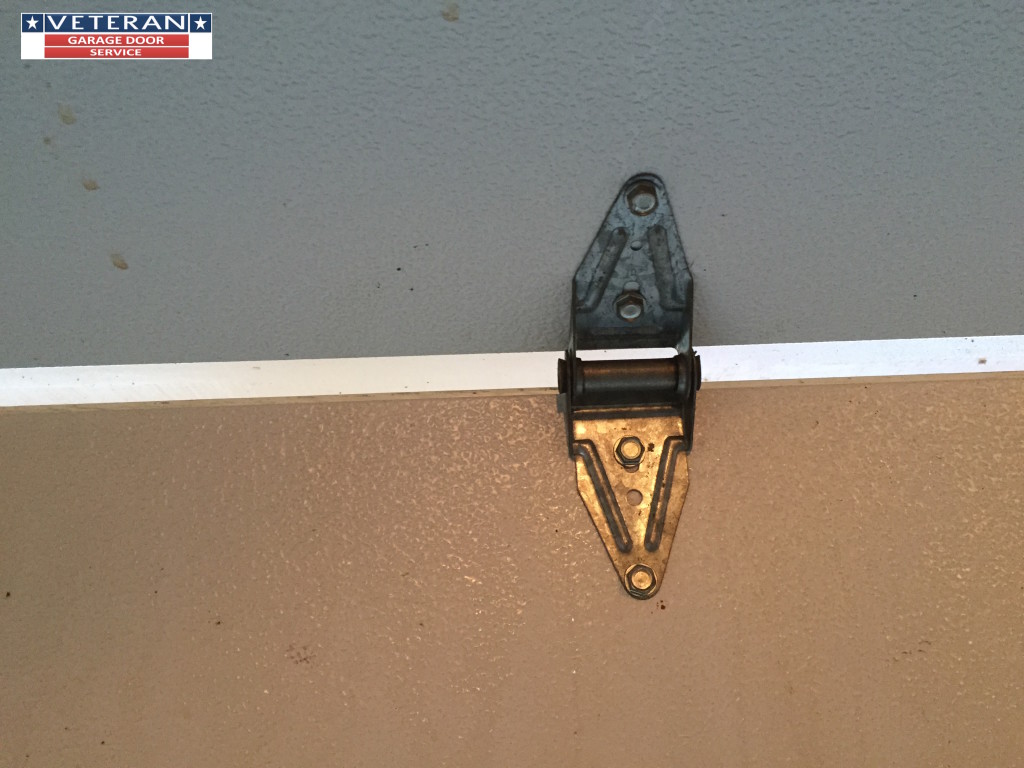 Can a broken Garage Door hinge damage the garage door?