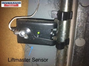 How do you repair a garage door sensor?