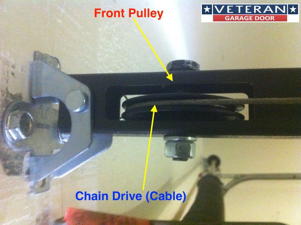 My garage door opener chain broke, how can I fix it? - Garage Door Opener Front Pulley Cable 1024x765