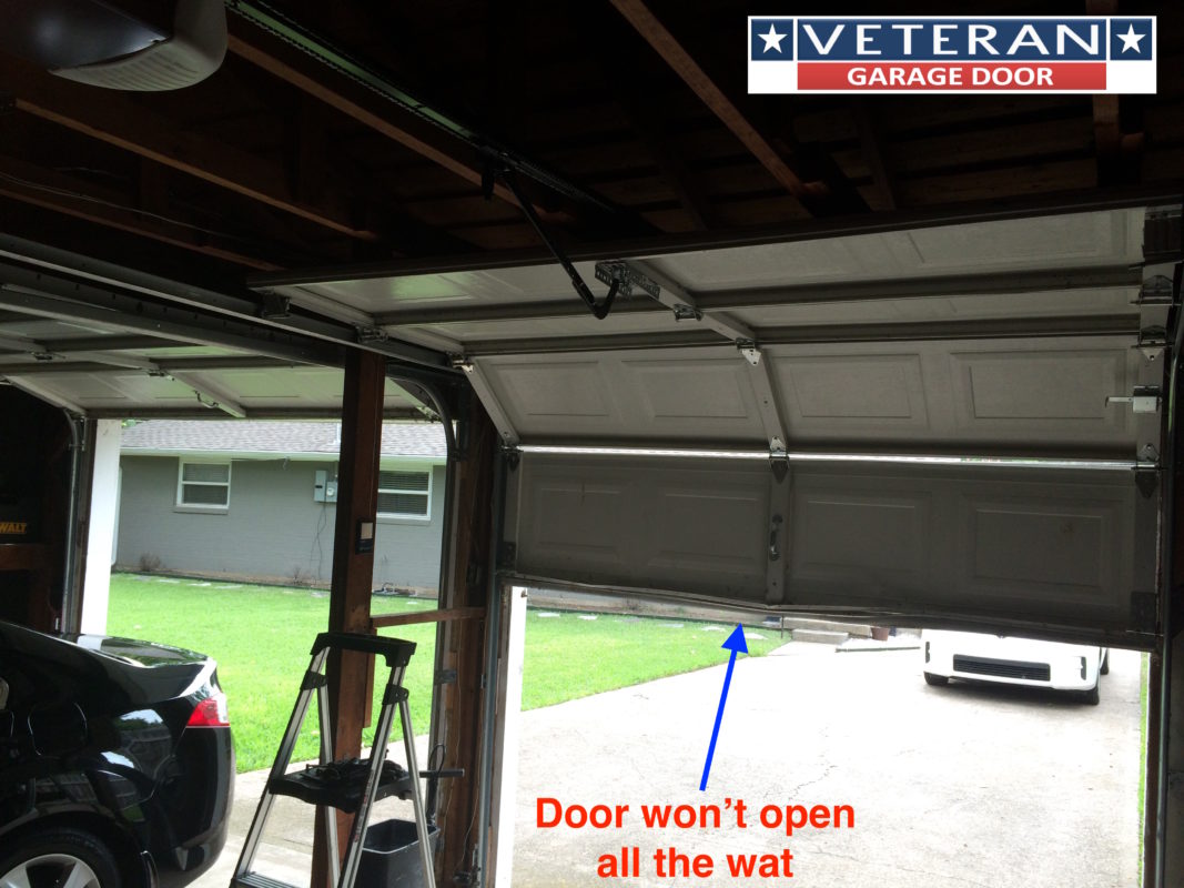 Minimalist Garage Door Is Not Opening All The Way for Small Space