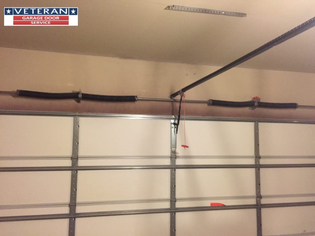 What size spring should I use for my 7’ garage door that weighs 185 pounds?