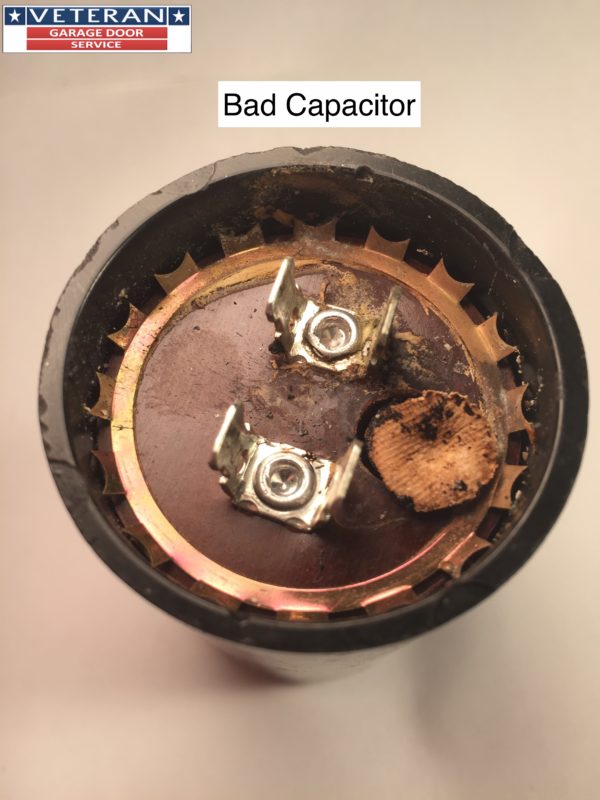 Can a garage door opener capacitor effect the logic board