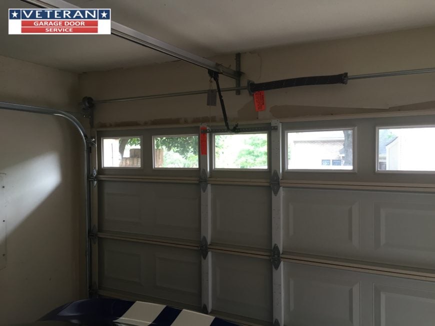 How can I secure my garage door against burglars