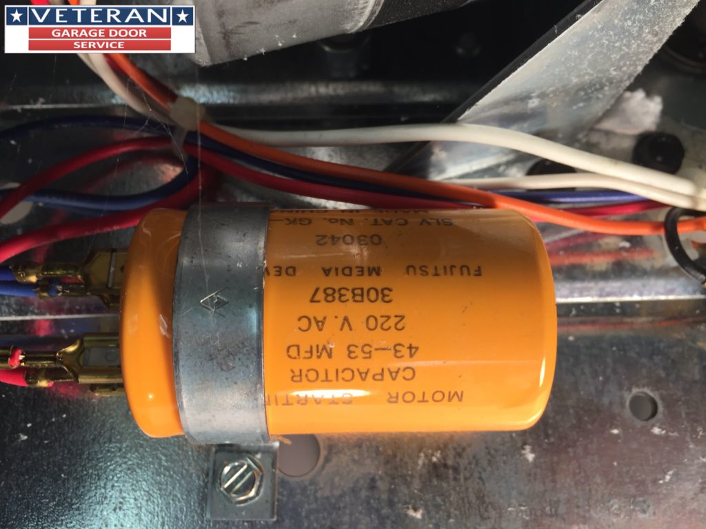 Can a garage door opener capacitor effect the logic board