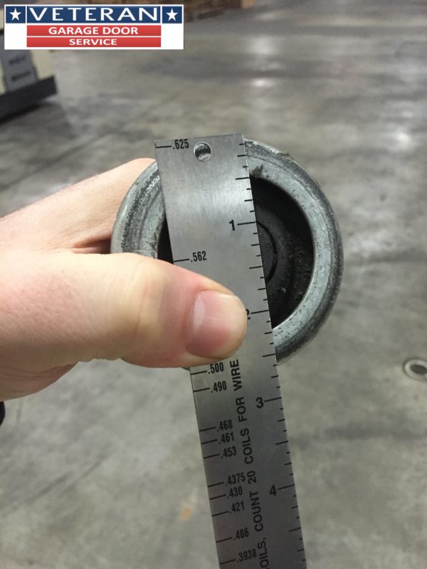 How do you know if garage door rollers should be replaced