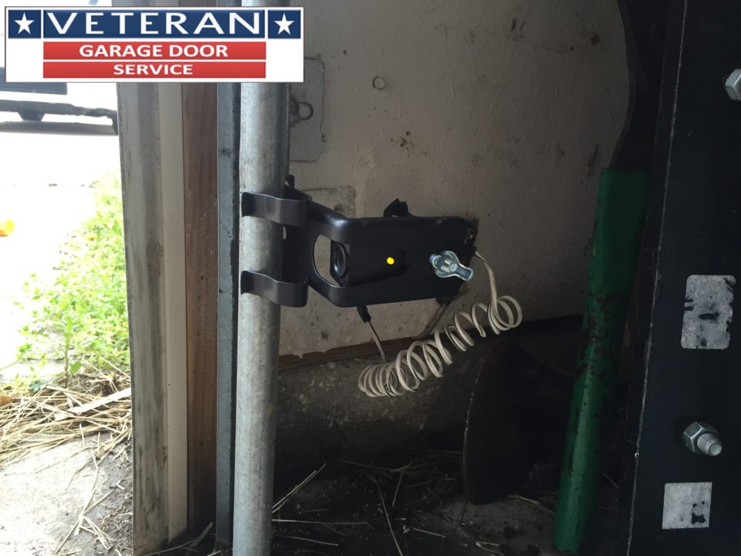 Where should I place my garage door safety eyes sensors
