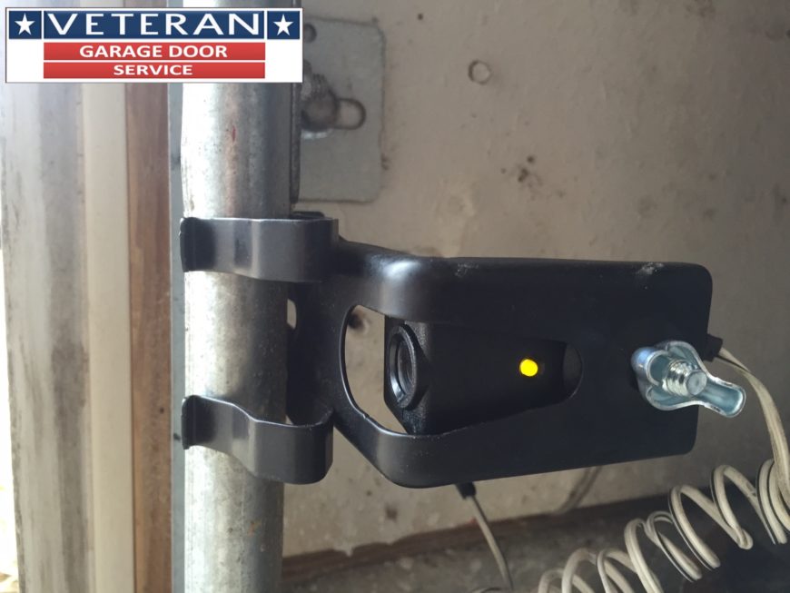 Where should I place my garage door safety eyes sensors