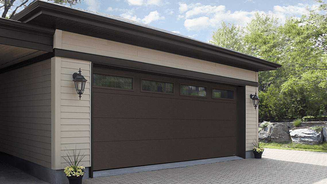 Steel Back Garage Door 1.3/8" and 2" 3 lyers doors.