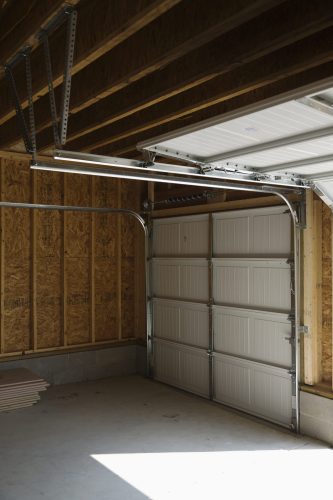 An insulated garage door helping to reduce costs on energy and utility bills