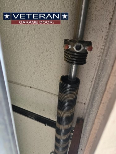 broken garage door spring