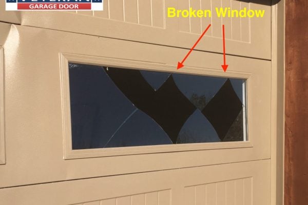 broken garage door window1